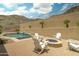 Inviting backyard with pool, fire pit, and comfortable seating area at 2722 W Hiddenview Dr, Phoenix, AZ 85045