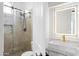 Modern bathroom with glass enclosed shower and vessel sink with illuminated mirror at 2722 W Hiddenview Dr, Phoenix, AZ 85045