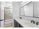 Bathroom with double sinks, large mirror, and shower-tub combo at 2722 W Hiddenview Dr, Phoenix, AZ 85045