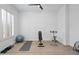Dedicated exercise room filled with fitness equipment, offering a private space for workouts and wellness at 2722 W Hiddenview Dr, Phoenix, AZ 85045