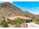 Desert home nestled against the mountains, featuring a three car garage, private drive and lush landscaping at 2722 W Hiddenview Dr, Phoenix, AZ 85045