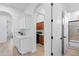 Open hallway that leads to a bathroom and laundry room at 2722 W Hiddenview Dr, Phoenix, AZ 85045
