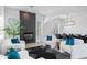 Bright living room features modern seating, a stylish fireplace, and an open floorplan at 2722 W Hiddenview Dr, Phoenix, AZ 85045