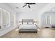 Bright main bedroom with plenty of natural light, shutters, and space for exercise equipment at 2722 W Hiddenview Dr, Phoenix, AZ 85045