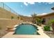 Beautiful pool with tiled edge and serene outdoor seating at 2722 W Hiddenview Dr, Phoenix, AZ 85045