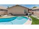 Sparkling pool with steps, offering a refreshing retreat in the private backyard oasis at 2813 N 107Th Dr, Avondale, AZ 85392
