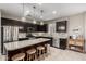 Spacious kitchen featuring stainless steel appliances, granite countertops, and a large island with seating at 29819 W Whitton Ave, Buckeye, AZ 85396