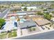 Aerial view of homes with private pools, lush landscaping, and neighborhood amenities nearby at 310 E Fremont Dr, Tempe, AZ 85282