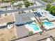 Aerial view of a home featuring a backyard with a private pool, covered patio, and ample space at 310 E Fremont Dr, Tempe, AZ 85282