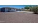 Backyard featuring desert landscaping, a pool, and a well-maintained exterior in a private setting at 310 E Fremont Dr, Tempe, AZ 85282