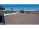 Large backyard with desert landscaping, mature trees, and a private pool, with a fence at 310 E Fremont Dr, Tempe, AZ 85282