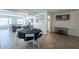 Bright dining room with wood-look tile floors and table with seating for four guests at 310 E Fremont Dr, Tempe, AZ 85282