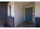 View of the home's front entryway door with house number at 310 E Fremont Dr, Tempe, AZ 85282