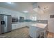 Beautiful kitchen with white cabinets, stainless appliances and complementary subway tile backsplash at 310 E Fremont Dr, Tempe, AZ 85282