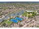 Aerial view of the community amenities including tennis courts, basketball courts, a club house, and desert landscaping at 31107 N 72Nd Pl, Scottsdale, AZ 85266