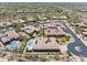 An aerial view of a single Gathering home with a pool and lush backyard surrounded by desert landscaping at 31107 N 72Nd Pl, Scottsdale, AZ 85266
