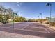 Outdoor basketball court with ample lighting and scenic desert surroundings at 31107 N 72Nd Pl, Scottsdale, AZ 85266