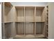 Spacious walk-in closet with custom shelving and ample storage space for clothing and accessories at 31107 N 72Nd Pl, Scottsdale, AZ 85266