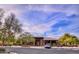 Community clubhouse with desert landscaping, covered entry, and convenient parking at 31107 N 72Nd Pl, Scottsdale, AZ 85266