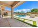 Beautiful backyard with covered patio overlooking a swimming pool and spa at 31107 N 72Nd Pl, Scottsdale, AZ 85266