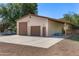 Large detached garage with two bays and an attached carport at 3357 N Ashbrook E St, Mesa, AZ 85213