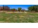 Community playground featuring swings and covered play structure, perfect for Gathering fun and outdoor activities at 3619 E Thornton Ave, Gilbert, AZ 85297
