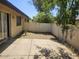 Backyard with concrete patio and block wall for privacy at 3807 W Mitchell Dr, Phoenix, AZ 85019