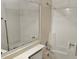 Simple bathroom featuring a shower-tub combination, toilet, and a vanity with a large mirror at 3807 W Mitchell Dr, Phoenix, AZ 85019