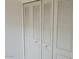 Bedroom closet with paneled doors at 3807 W Mitchell Dr, Phoenix, AZ 85019