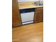 Kitchen featuring wood cabinets, stainless steel sink and appliances at 3807 W Mitchell Dr, Phoenix, AZ 85019
