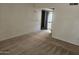 Cozy living room featuring carpet and access to the backyard at 3807 W Mitchell Dr, Phoenix, AZ 85019