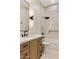 Elegant bathroom features a walk-in shower with soaking tub and dual vanity at 3848 E Fairmount Ave, Phoenix, AZ 85018