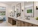 Bright main bathroom boasts double sinks, quartz counters, and modern mirrors at 3848 E Fairmount Ave, Phoenix, AZ 85018