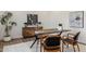 Well-lit office space with wood desk, stylish chairs, and decor at 3848 E Fairmount Ave, Phoenix, AZ 85018