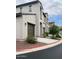 Contemporary home exterior with attached garages, well-kept landscaping, and clean lines at 3900 E Baseline Rd # 166, Phoenix, AZ 85042
