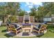 Outdoor fireplace with seating area, perfect for entertaining or relaxing with Gathering and friends at 3900 E Baseline Rd # 166, Phoenix, AZ 85042