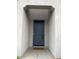 Inviting front door with an arched entryway and a welcome mat at 3900 E Baseline Rd # 166, Phoenix, AZ 85042