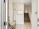 Hallway with stairs and tile flooring, leading to the upper level of the home at 3900 E Baseline Rd # 166, Phoenix, AZ 85042