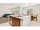 Open kitchen and living area with stainless steel appliances and modern countertops at 3900 E Baseline Rd # 166, Phoenix, AZ 85042