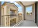 This is a patio with decorative railings and a view of another building at 3900 E Baseline Rd # 166, Phoenix, AZ 85042