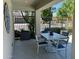 Charming outdoor patio with a stylish granite table and comfortable seating arrangement at 3900 E Baseline Rd # 166, Phoenix, AZ 85042