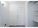 Laundry room with storage shelving at 4116 W Marshall Ave, Phoenix, AZ 85019