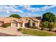 Lovely single Gathering home, two car garage, beautifully landscaped with mature trees and lawn at 4215 W Hackamore Dr, Phoenix, AZ 85083