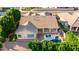 Aerial view displaying the home with a backyard swimming pool and covered patio at 4215 W Hackamore Dr, Phoenix, AZ 85083