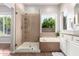 Bathroom featuring a shower, soaking tub, and white vanity with a granite-look countertop at 4215 W Hackamore Dr, Phoenix, AZ 85083