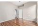 Bright bedroom with modern flooring, and a closet with sliding doors at 4215 W Hackamore Dr, Phoenix, AZ 85083