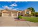 Well maintained single story home with two-car garage, beautiful landscaping, and inviting entrance at 4215 W Hackamore Dr, Phoenix, AZ 85083