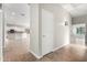 Hallway with a view of the kitchen and a bright, open living space that provides smooth transitions at 4215 W Hackamore Dr, Phoenix, AZ 85083