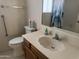 Neutral bathroom with a single sink vanity, toilet, and shower/tub combination at 4301 E Amberwood Dr, Phoenix, AZ 85048
