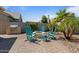 Covered patio and BBQ area with a firepit and outdoor seating at 4426 E Leroy St, Gilbert, AZ 85295